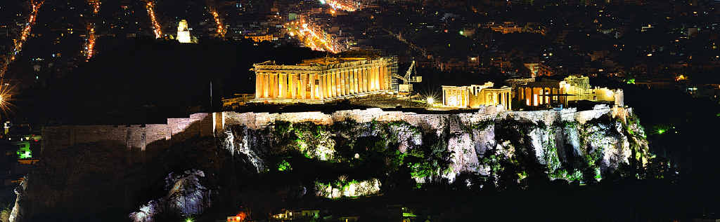 The Plaka is a labyrinth of old narrow streets at the base of the mighty Acropolis in Athens. The Plaka is a labyrinth of old narrow streets at the base of the mighty Acropolis in Athens.